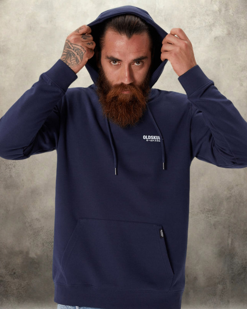 Man wearing Oldskull Hoodie in navy blue